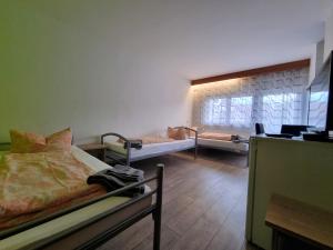 Postel nebo postele na pokoji v ubytování Monteurzimmer - Karlsbad