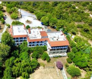 an overhead view of a building with a lot of trees at Philoxenia in Kavála