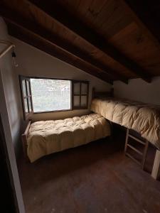 Ένα ή περισσότερα κρεβάτια σε δωμάτιο στο Casa La Boticaria