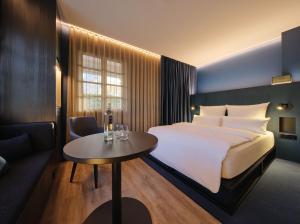 Postel nebo postele na pokoji v ubytování Hotel am Sophienpark