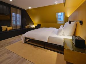 Postel nebo postele na pokoji v ubytování Hotel am Sophienpark