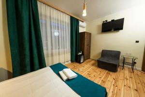 Posteľ alebo postele v izbe v ubytovaní Elegant Apartments