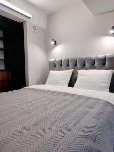 Ένα ή περισσότερα κρεβάτια σε δωμάτιο στο Eva Loft