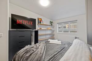 Cama o camas de una habitación en Best Possible Location-Laugavegur Luxury Loft