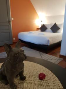 Ein Bett oder Betten in einem Zimmer der Unterkunft chambres et gites d'étretat