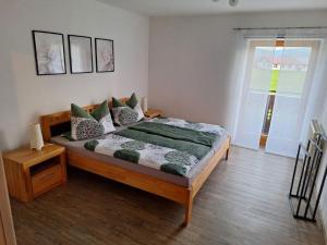 Postel nebo postele na pokoji v ubytování Ferienwohnung Koller