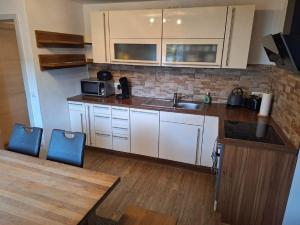 Kuchyň nebo kuchyňský kout v ubytování Ferienwohnung Koller