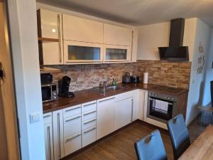 Kuchyň nebo kuchyňský kout v ubytování Ferienwohnung Koller