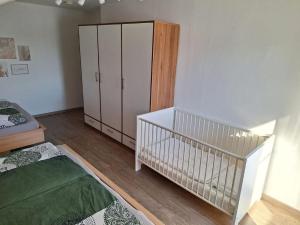 Postel nebo postele na pokoji v ubytování Ferienwohnung Koller