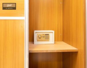 Televízia a/alebo spoločenská miestnosť v ubytovaní Al Manzel Sheikh Zayed