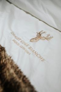 A bed or beds in a room at Chalet Cime Bianche