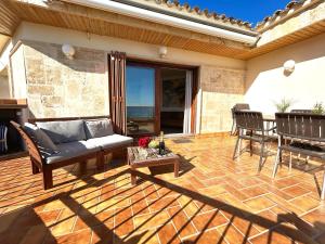 Posedenie v ubytovaní Charming apartment in La Fosca Beach