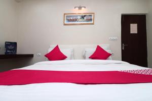 Cama o camas de una habitación en OYO 5189 Hotel East Lite