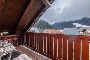 a balcony with a view of a mountain at Apartment Eli in Kranjska Gora