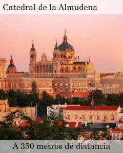a large building in a city with the words cathedral de la albuquerque at Suites You Soho in Madrid
