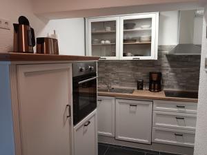 Kuchyň nebo kuchyňský kout v ubytování Ferienwohnung Schwarzenbergblick