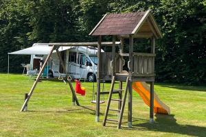 Children's play area sa Mini Camping Drentse Monden