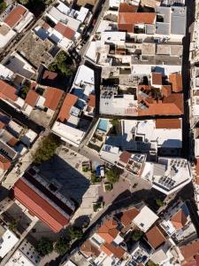 an overhead view of a city with buildings at TWO VAULTS, Rethymno old town in Rethymno
