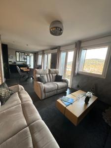 Posedenie v ubytovaní La reine appartement pour deux personnes avec magnifique vue et jacuzzi