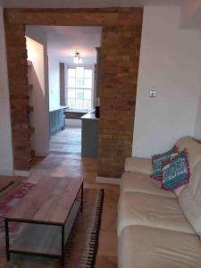 אזור ישיבה ב-Beautiful and spacious flat in Central Shoreditch