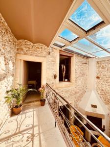Balcon ou terrasse dans l'établissement La maison du Bougainvillier 10 personnes