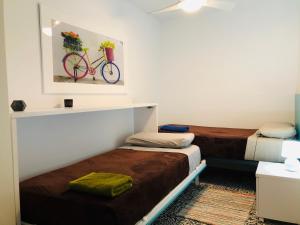 Postel nebo postele na pokoji v ubytování Apartamento cerca de la playa y Ciudad de las Ciencias