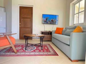 Istumisnurk majutusasutuses Aruanda Apartment - perfect get-away for two at the top of Bequia