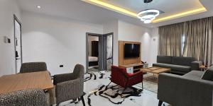 Televízia a/alebo spoločenská miestnosť v ubytovaní The Safron Hotel