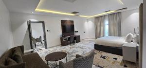 Posteľ alebo postele v izbe v ubytovaní The Safron Hotel