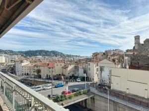 a view of a city from a balcony at AGENCIA appartement 2 chambres au Suquet in Cannes