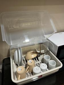 Příslušenství pro přípravu čaje a kávy v ubytování Bitec Bangna Bkk