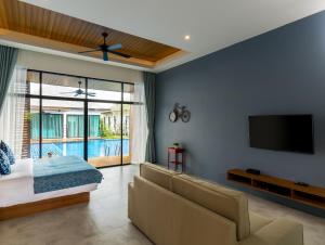 TV a/nebo společenská místnost v ubytování Vann Hua Hin Resort