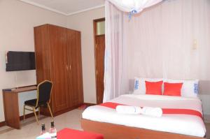 Postel nebo postele na pokoji v ubytování HOTEL SENATE JUJA