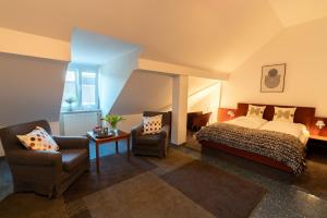 Postel nebo postele na pokoji v ubytování Hotel Carlton Munich