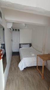 Ein Bett oder Betten in einem Zimmer der Unterkunft Chubby 9 Room 7