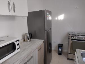 Kuchyň nebo kuchyňský kout v ubytování Casa Arriendo Diario