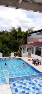 สระว่ายน้ำที่อยู่ใกล้ ๆ หรือใน Aw Hotel Acawa Resort & Piscina
