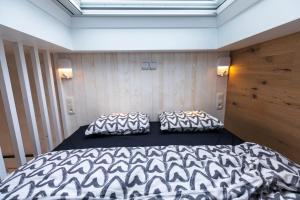 Tempat tidur dalam kamar di Tiny house avec vue sur les étoiles