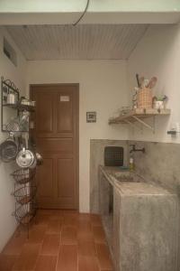 Kuchyň nebo kuchyňský kout v ubytování Casa no coração da vila de Caraiva