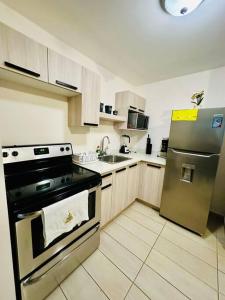 A kitchen or kitchenette at 3BR Apartment in Acacias San Ignacio