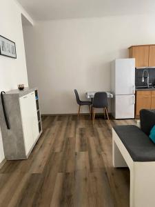 Kuchyň nebo kuchyňský kout v ubytování Apartment by Pepsi