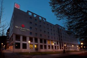 a building with a sign on the side of it at NH Collection San Sebastián Aranzazu in San Sebastián