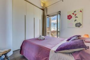 Postel nebo postele na pokoji v ubytování Casa Nanuk - Capoliveri