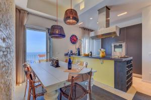 Kuchyň nebo kuchyňský kout v ubytování Casa Nanuk - Capoliveri