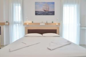 Fotografie z fotogalerie ubytování Evas Rooms v destinaci Néoi Póroi