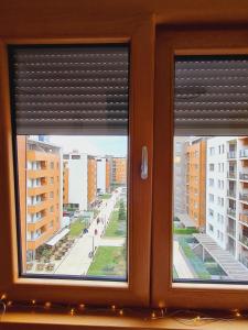 a view of a city from a window at Andrea A blok in Novi Beograd