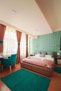 Postel nebo postele na pokoji v ubytování Hotel Euforia Lounge