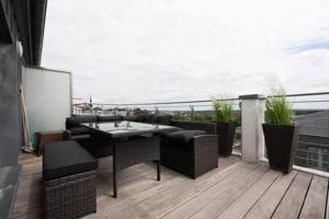A balcony or terrace at Modern 2BR Apt in Sandweiler with Terrace