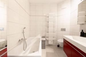 A bathroom at Modern 2BR Apt in Sandweiler with Terrace