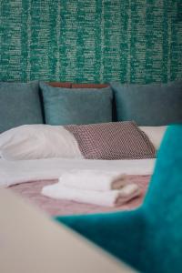 Postel nebo postele na pokoji v ubytování Hotel Euforia Lounge